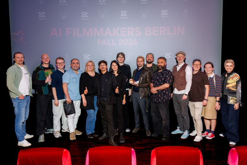 Filmmakers and organizers on stage in front of the AI Filmmakers Berlin Fall 2026 screen
